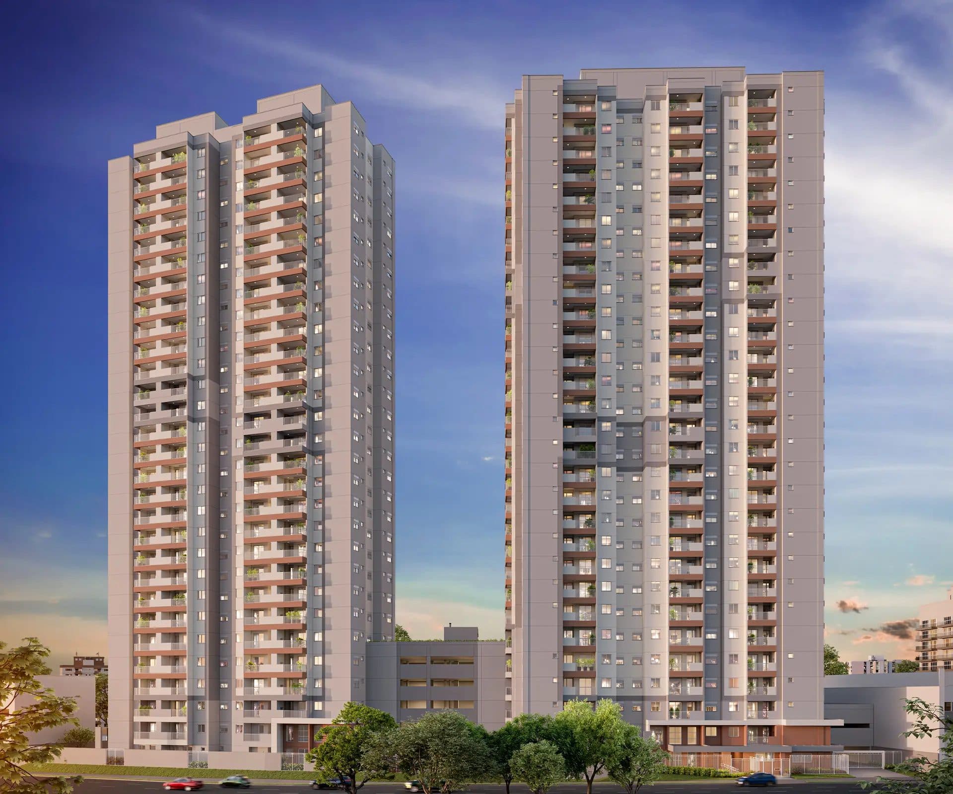 Fachada de dois edifícios residenciais altos com varandas e iluminação noturna