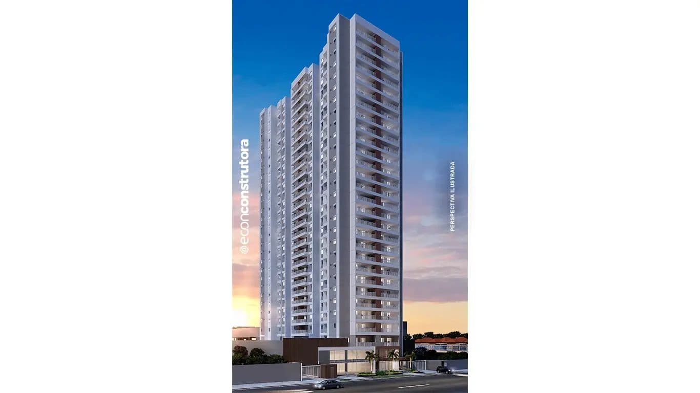 Fachada do edifício residencial de múltiplos andares com varandas e iluminação de entardecer.